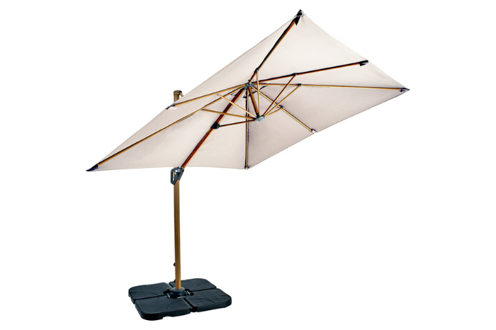 Beige patio umbrella with a stand on a white background