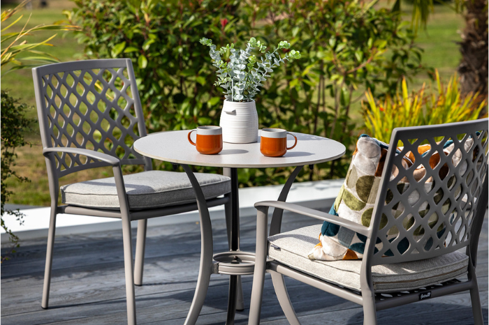 Avebury outdoor patio set with a chair and table on a wooden deck