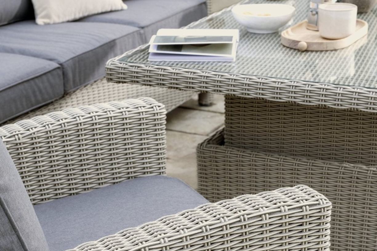 Close up of Kettler Palma glass table top with book