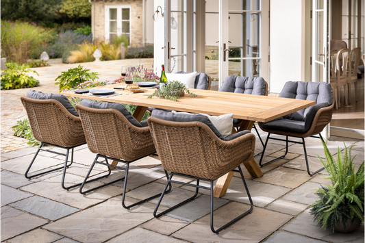 Hartman Rayo 6 seat Regis teak dining set in a garden setting