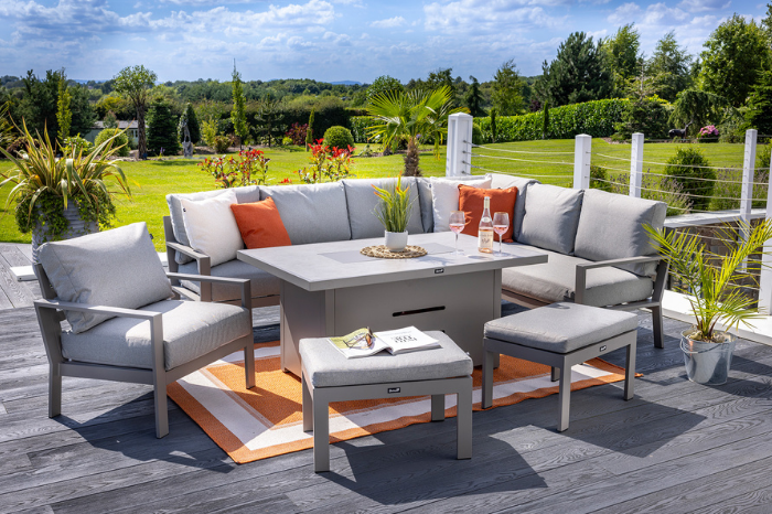 Outdoor patio set with furniture and table on a wooden deck