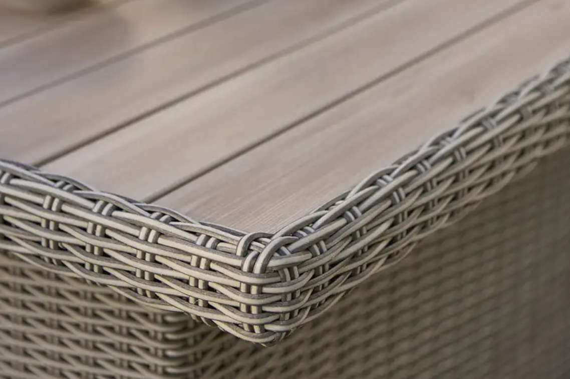Close-up of Kettler slat top table with a neutral background