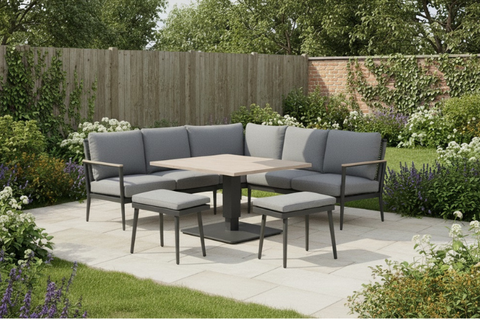 Kettler Merano aluminium corner set with high low table styled in a modern garden