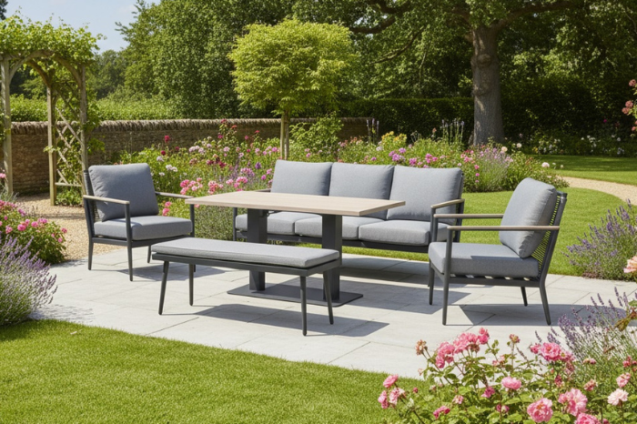 Merano aluminium 7 seat sofa set with high low table styled in a modern garden