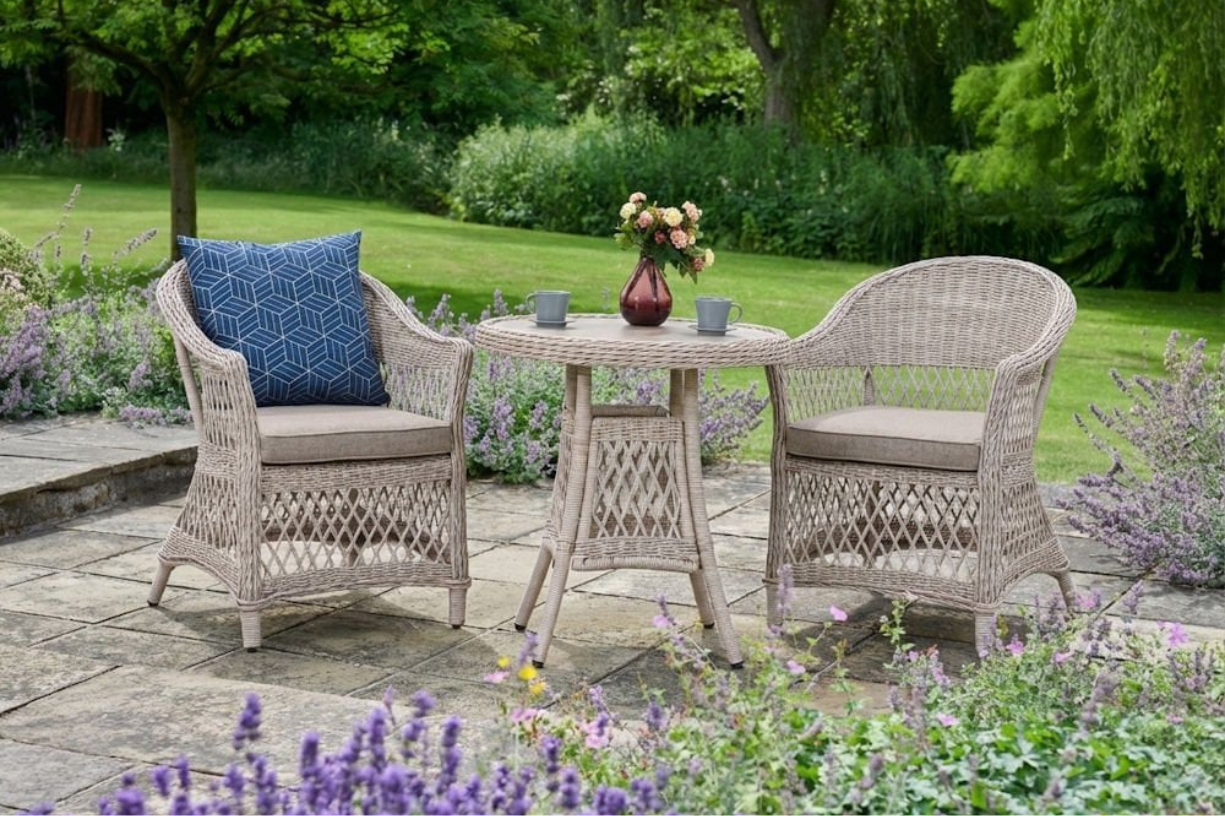 Norfolk Leisure Cotswold wicker 2 seat bistro set with ceramic glass table and woven chairs for garden or patio dining.
