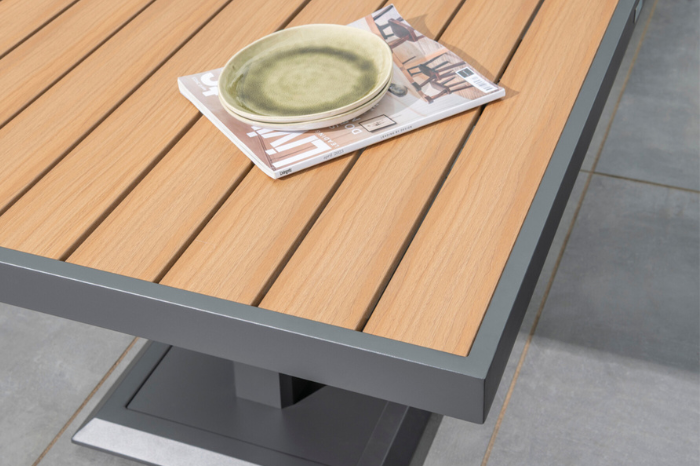 Polywood slatted tabletop detail from the Norfolk Leisure Sutton Large Corner Set showing the natural wood-effect finish.