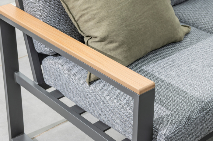 Close-up of the Norfolk Leisure Sutton Mini Corner Set armrest featuring Polywood accent and grey aluminium frame.