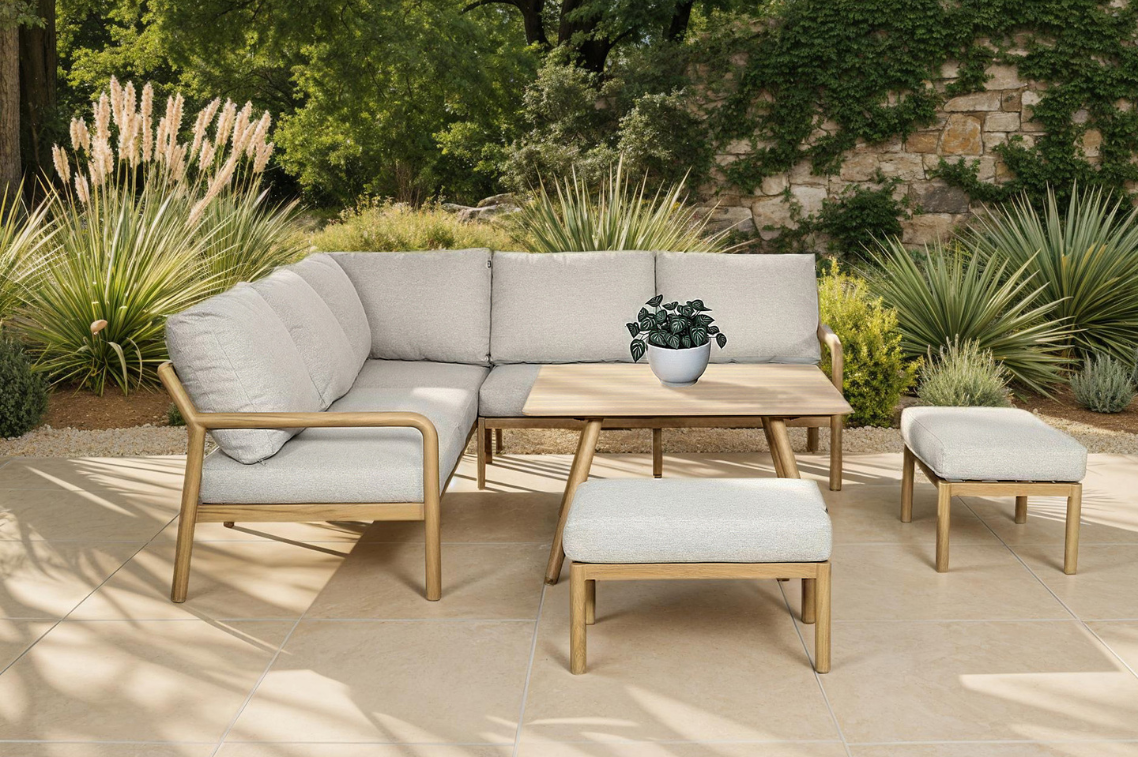 Sahara Square Corner Lounge Set featuring Weatherready cushions and slatted Folie coffee table displayed in a mature garden.