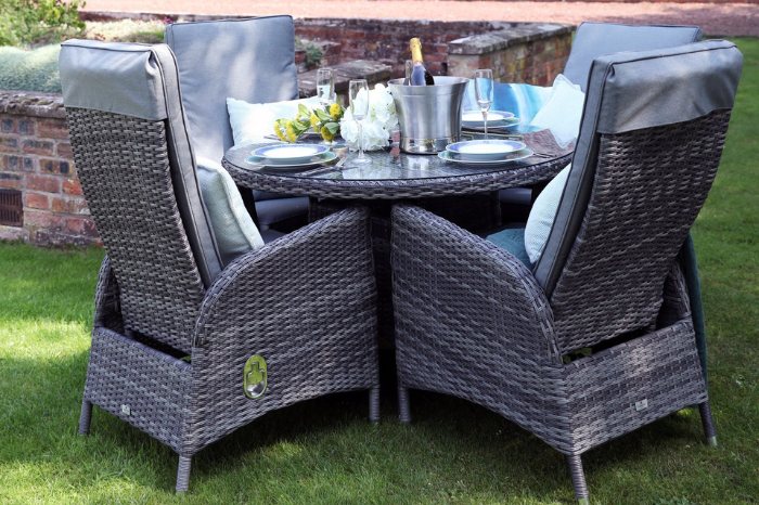 Tivoli 4 seat reclining garden dining set styled with tableware and cushions